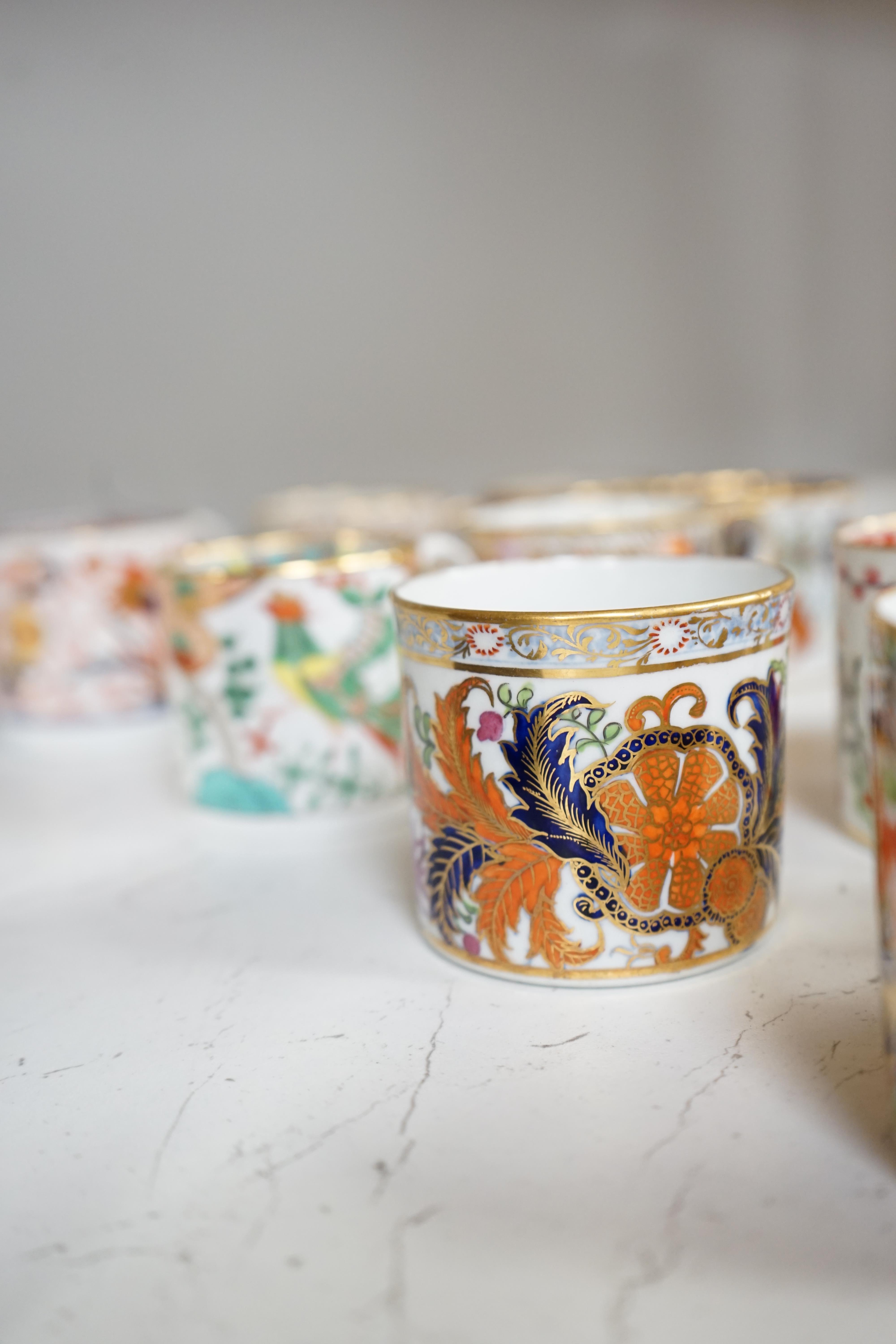 Twelve mixed 1800-1820 English porcelain Imari patterned coffee cans